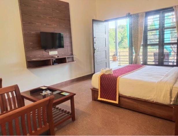 Hotel Coorggavadana à Madikeri Extérieur photo