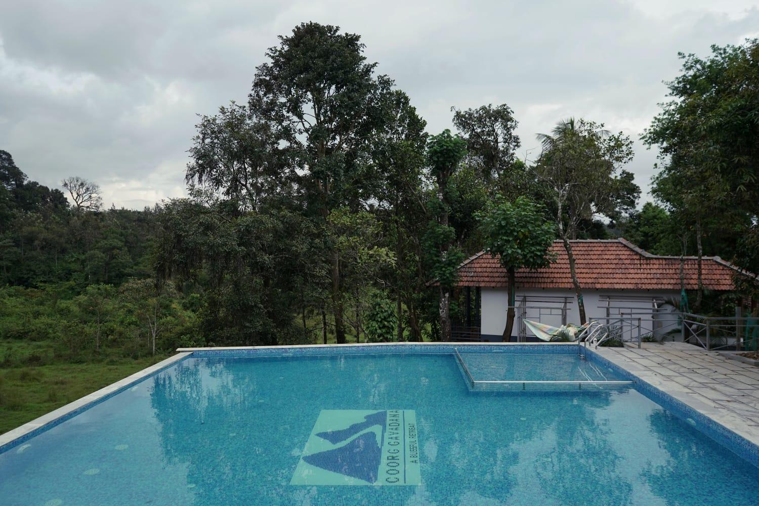 Hotel Coorggavadana à Madikeri Extérieur photo